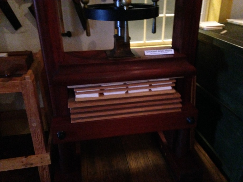 large press to push pages of book of mormon large press to push pages of book of mormon