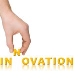 How to Promote Innovation in Your Organization Hand and word Innovation